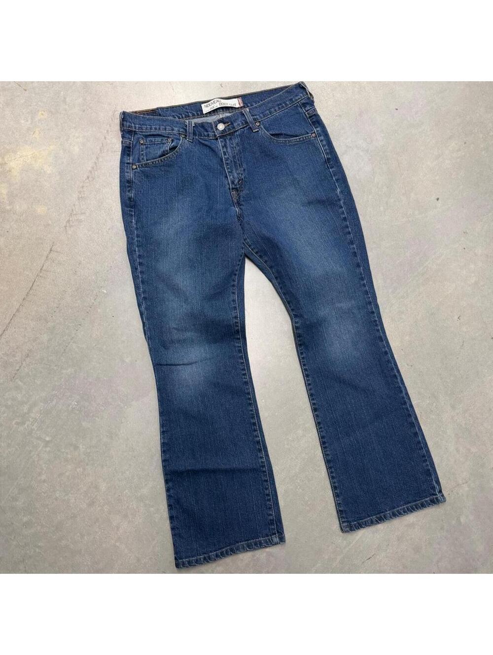 2000s Women's Nouveau Bootcut Levis 515 Navy Jeans Sized 12 S
